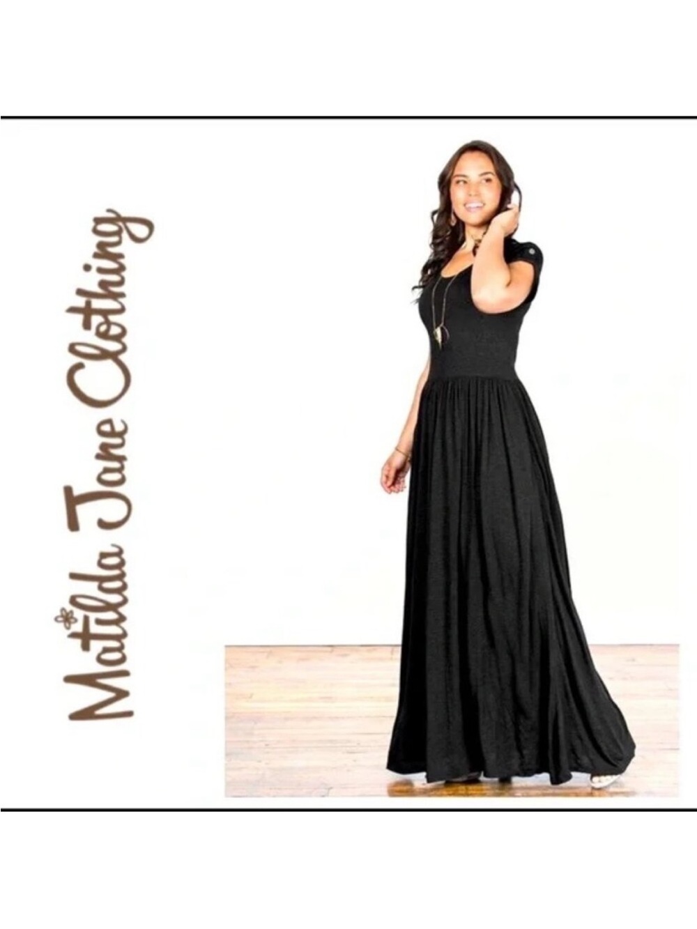 Matilda black short roll tab sleeve maxi skirt with drop waist and pockets